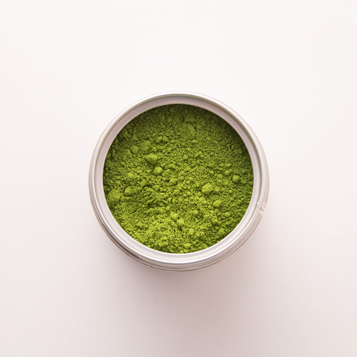 Close-up of vibrant green organic matcha powder, grown without pesticides and jas certified