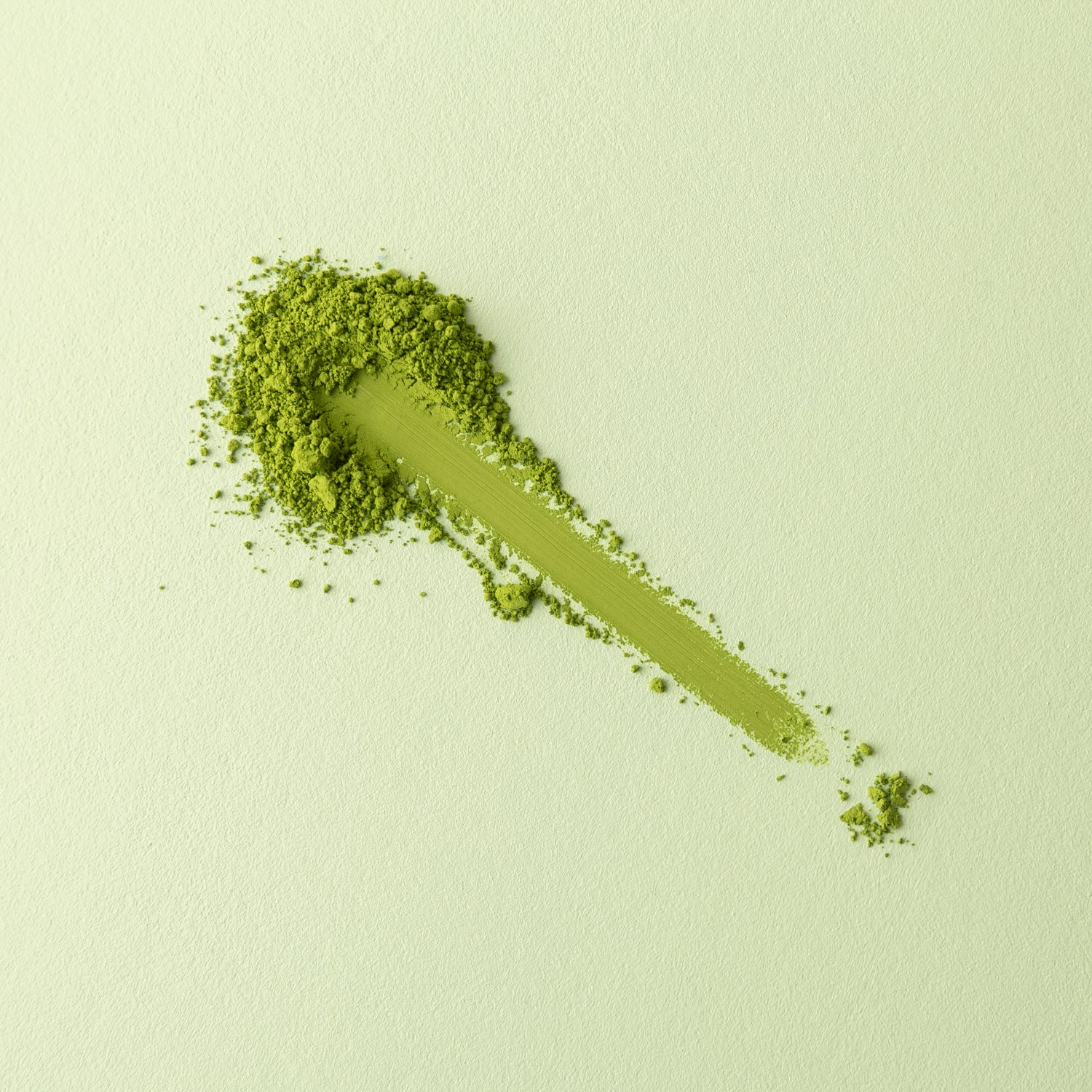 Matcha powder swipe test revealing its fine texture and high quality for smooth, easy preparation